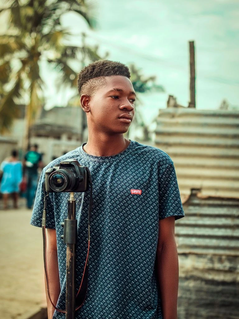 Portrait of GhanaFilla correspondent Naa Korkor at a market in Tamale.